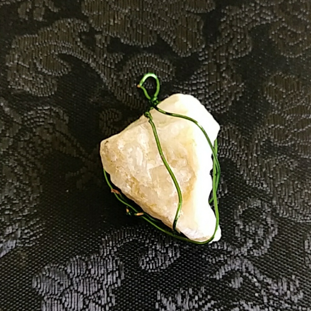 Wire wrapped crystal healing stone pendant